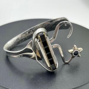 Clyde Edward Casey Inscribed Script Harmonica Cuff Bracelet Adjustable